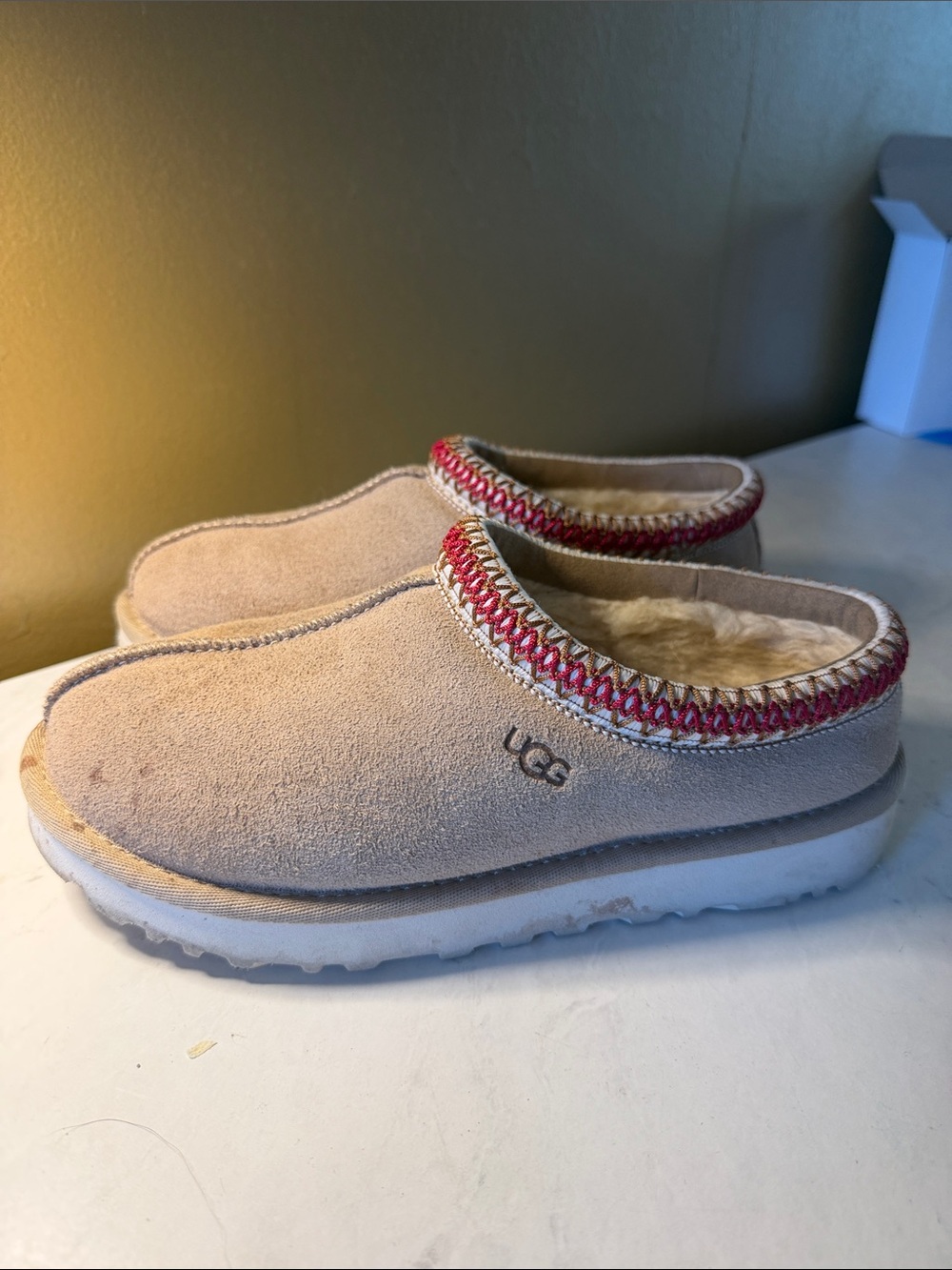 UGG Tan Suede Slip-On Shearling Clogs with Red Trim